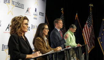 The four Alaska candidates for U.S. House stand on a debate stage