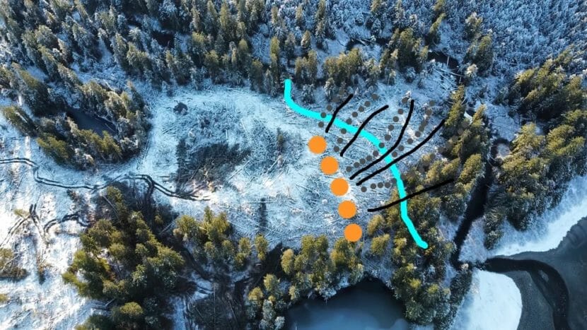 An aerial photo of the clear-cut area annotated to show the locations of boulders and rock walls.