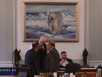 The chairs of the Senate Finance Committee huddle for a discussion after introducing their draft operating budget, Thursday, April 24, 2025.