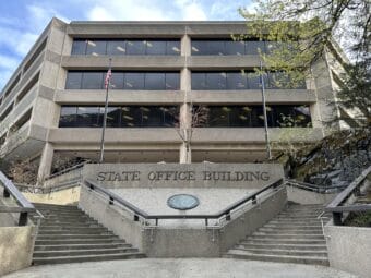 big concrete office building on a clear day