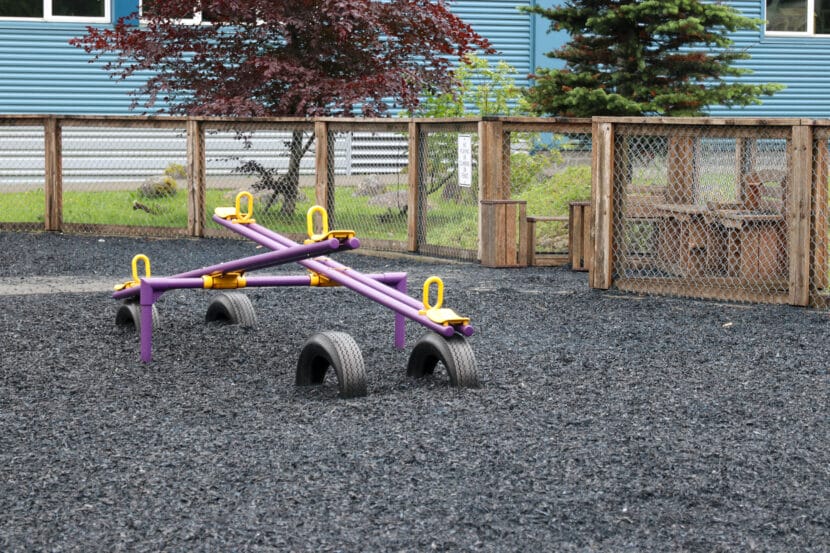 Two purple seesaws are propped on tires at Harborview Elementary School in Juneau.