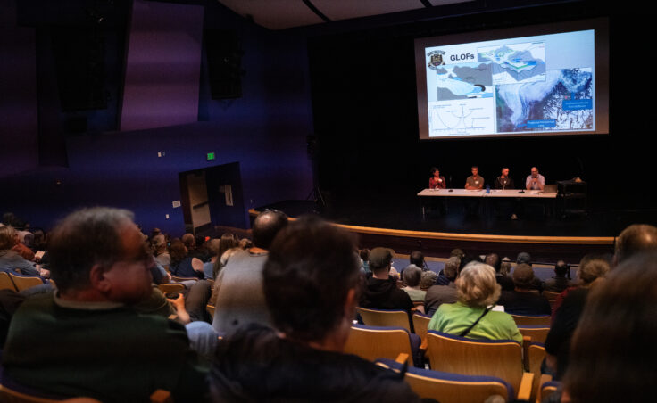 Erin Stockdale, Curtis Lee, Mike Records and Leif Hammes from the U.S. Army Corps of Engineers present the federal process to come up with a long-term flood protection solution for Mendenhall Valley on July 30, 2025. (Photo by Alix Soliman/KTOO)