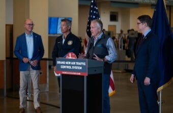 U.S. Sen. Dan Sullivan speaks at an aviation roundtable at Ted Stevens International Airport in Anchorage on Aug. 12, 2025.