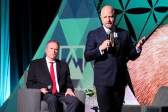 Gov. Mike Dunleavy (left) listens to Glenfarne CEO Brendan Duval (right) talk about the Alaska LNG Project during a panel on Thursday, June 5, 2025 in Anchorage, Alaska.