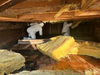 Alaska Organized Militia members remove debris while supporting storm recovery operations at Kotzebue, Alaska, Oct. 15, 2025.