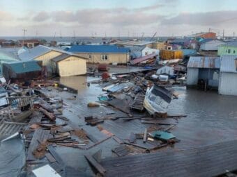 Parts of Kipnuk are covered with water and debris M