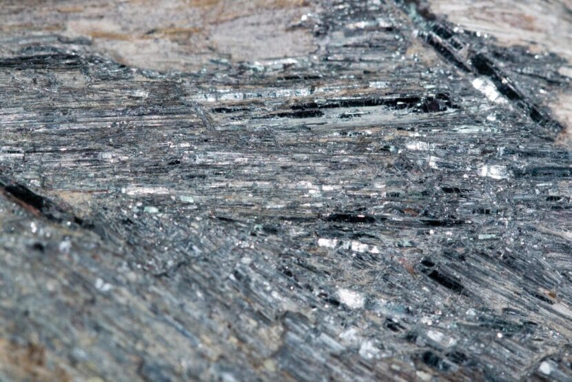 Stibnite, the predominant ore mineral of antimony, is shown.