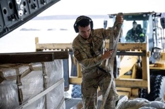 Alaska Air National Guard C-17 Globemaster III aircrew, assigned to the 176th Wing, offload gear and supplies at Bethel, Alaska, while supporting storm recovery operations following Typhoon Halong, Oct. 15, 2025.
