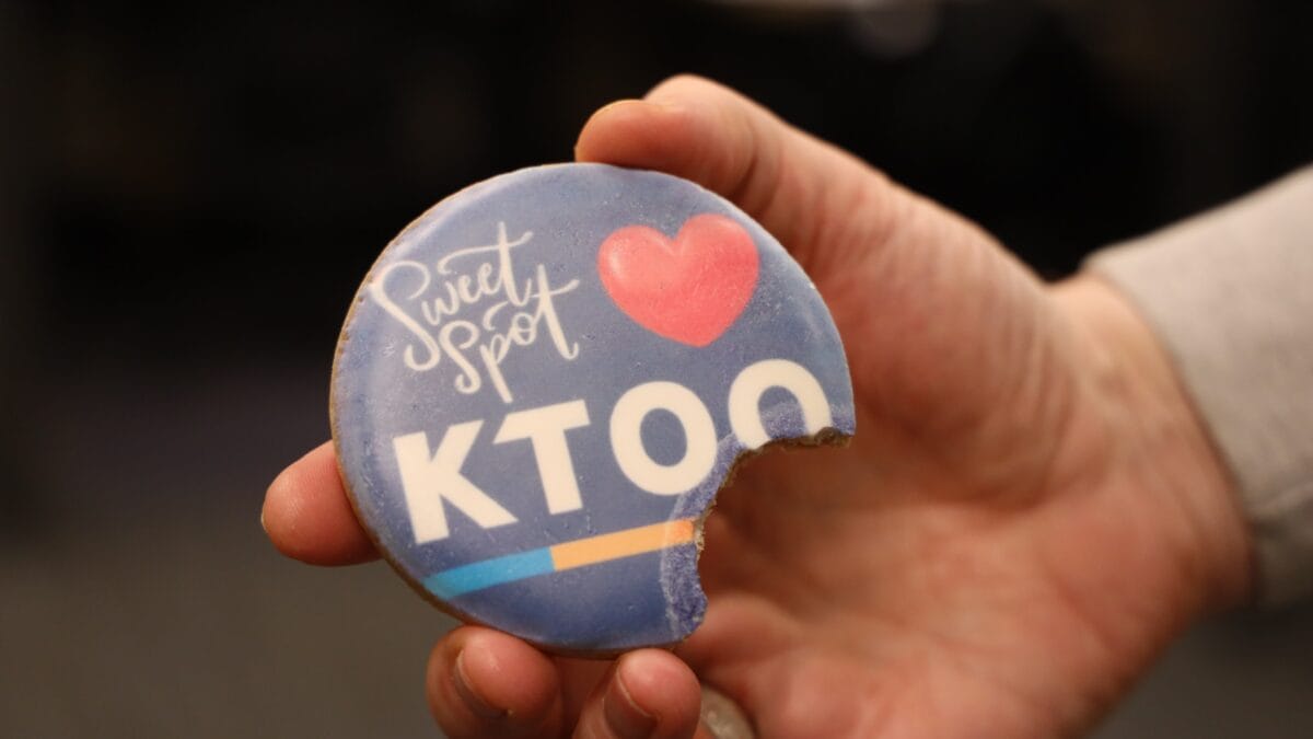 A snickerdoodle cookie decorated with the KTOO logo by Sweet Spot Studios owned by Chef Jossie Lukacik, who will be appearing at The Public Market ahead of opening a business in Juneau. (Clarise Larson/LTOO)