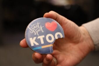 A snickerdoodle cookie decorated with the KTOO logo by Sweet Spot Studios owned by Chef Jossie Lukacik, who will be appearing at The Public Market ahead of opening a business in Juneau. (Clarise Larson/LTOO)