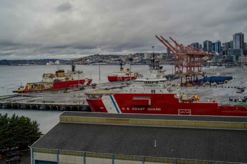 The U.S. Coast Guard icebreakers Polar Star (at background), Healy (at left) and Storis (at foreground) are seen together at Coast Guard Base Seattle on Oct. 26, 2025, marking the first time since 2006 that the Coast Guard had three active polar icebreakers in the same place at the same time.