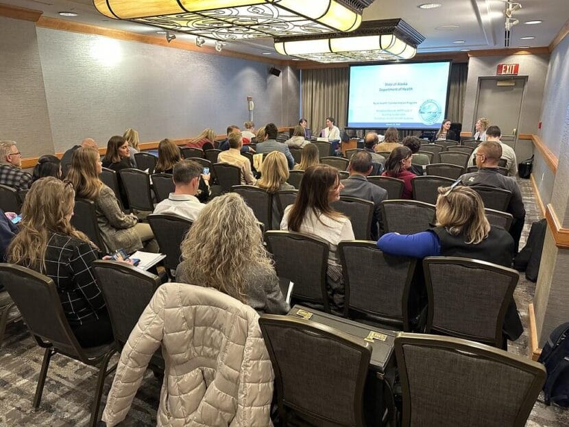 Attendees watch during a breakout session at the kickoff of Alaska's Rural Health Transformation Program in Anchorage on Jan. 15, 2025.
