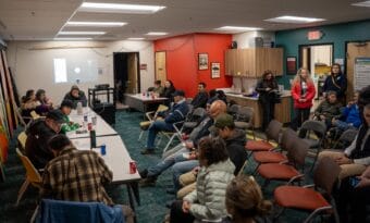 A few dozen people gathered in Anchorage on Jan. 31, 2026, while several dozen more joined virtually, to discuss whether to rebuild or relocate Kipnuk.