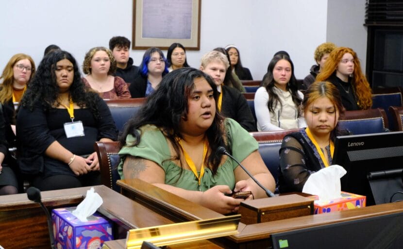Kxlo Stone (left) and Trinity Beltz (right) testify to the importance of protecting sibling relationships in foster care to the House Judiciary Committee on Feb. 26, 2026. Stone’s sister Tali Stone sits behind her.
