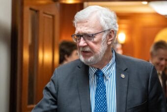 Senate President Gary Stevens, a Kodiak Republican, exits the Senate chamber on May 15, 2024.