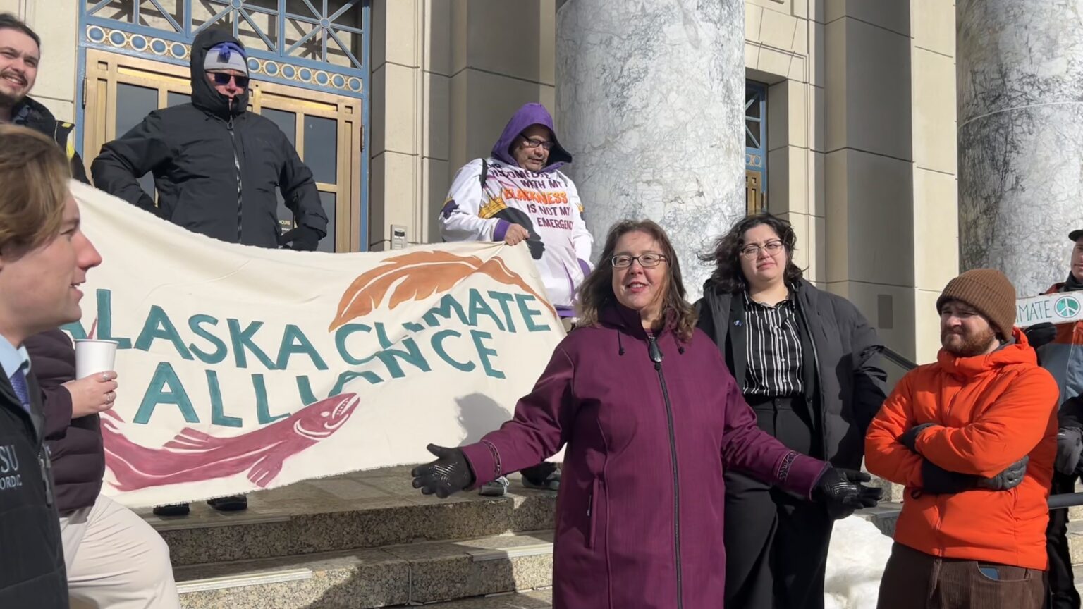 Small group of Alaskans rally for climate action at Capitol