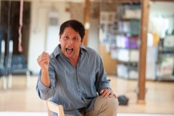Enrique Bravo rehearses "Where Did We Sit on the Bus?" in April 2026. The production is produced by Theater Alaska. (Photo by Flordelino Lagundino)