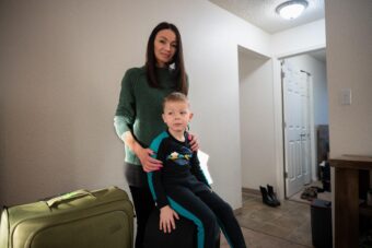 Olena Dubchenko and her son Maksim, 4, in their Anchorage apartment before leaving to Seattle on March 27, 2026.