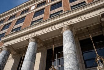 The Alaska State Capitol is illuminated by sunlight on Feb. 14, 2025.