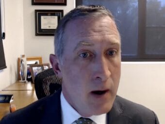 man in suit in an office