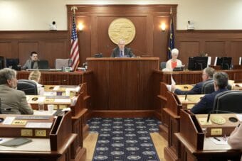 Lawmakers in the Alaska House of Representatives await the beginning of a new special session on June 20, 2026.
