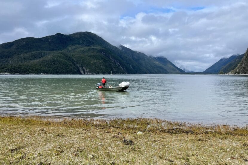 Liam Wirak Cassidy, who collects samples to track paralytic shellfish toxins for the Chilkoot Indian Association, participating in a beach cleanup in spring 2025.