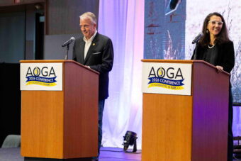 two people at podiums