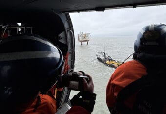 U.S. Coast Guard personnel conduct aerial survey of the North Trading Bay sheen location and the inactive Spark platform on Wednesday, Aug. 26, 2026 in Cook Inlet, Alaska.