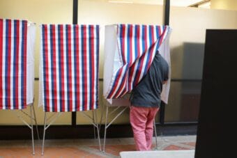 An Alaskan votes in the primary election at the State Office Building in Juneau on Aug. 18, 2026.