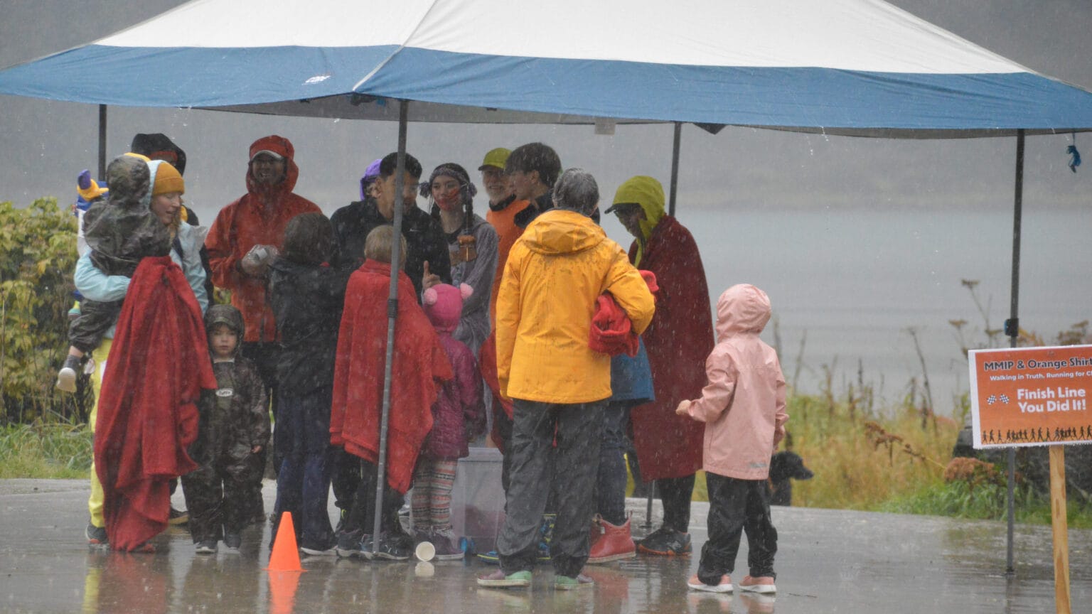 Dozens turn up in pouring rain for the first MMIP and Orange Shirt Day walk and run in Juneau