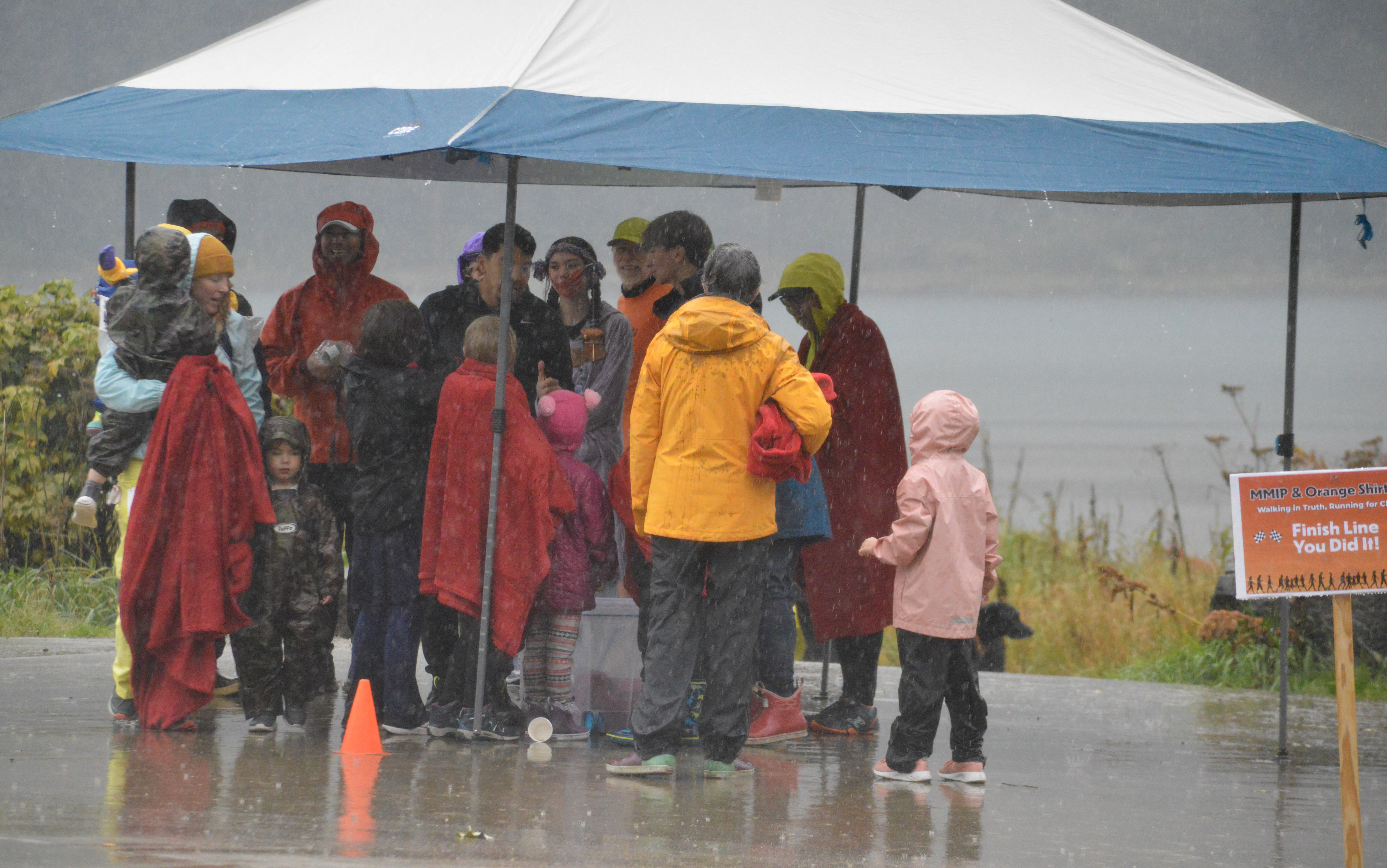 Dozens turn up in pouring rain for the first MMIP and Orange Shirt Day walk and run in Juneau