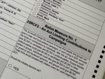 A sample ballot seen at the headquarters of the Alaska Division of Elections on Thursday, July 9, 2026, shows the language for the campaign finance ballot measure.